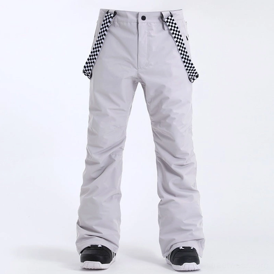 Light gray unisex snow ski pants with black and white checkerboard detachable suspenders and flared legs
