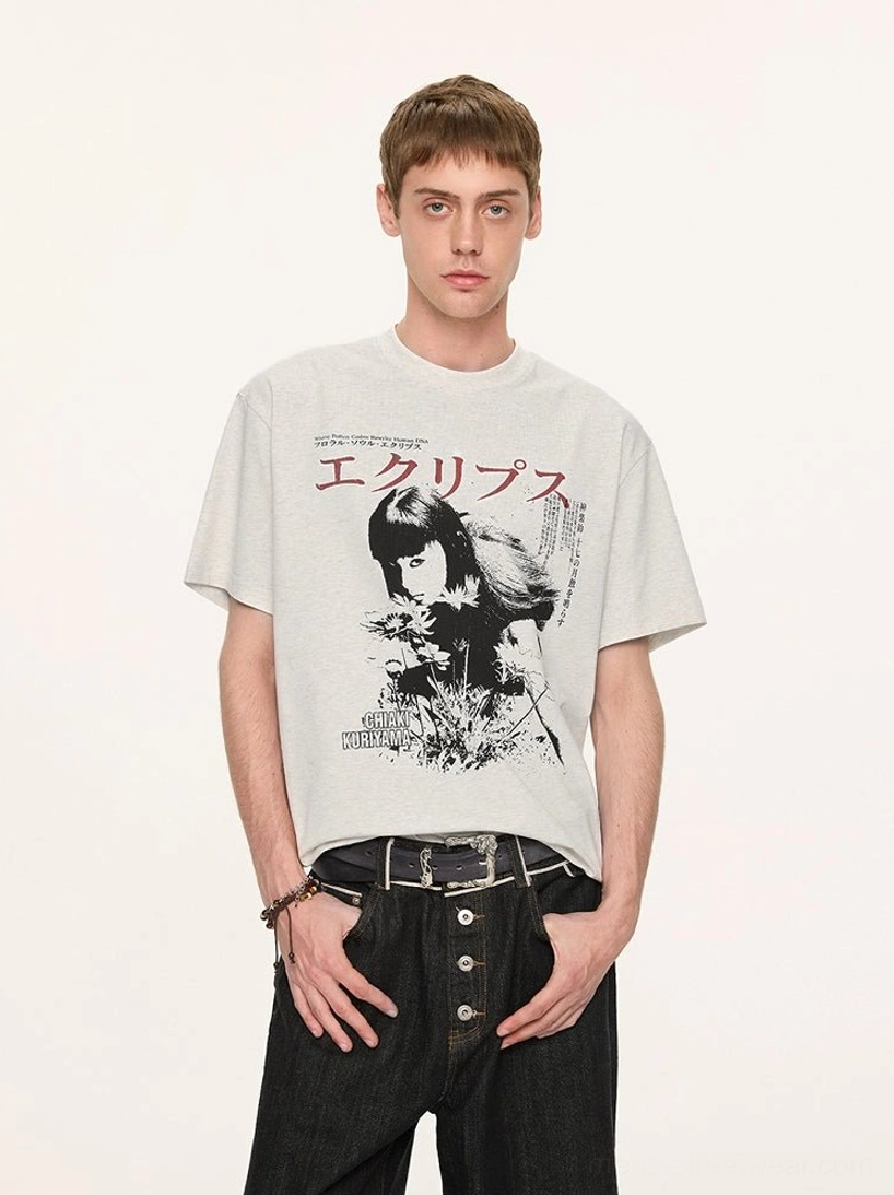 Light gray Japanese retro graphic T-shirt with anime-inspired portrait print and red Japanese lettering worn with black jeans