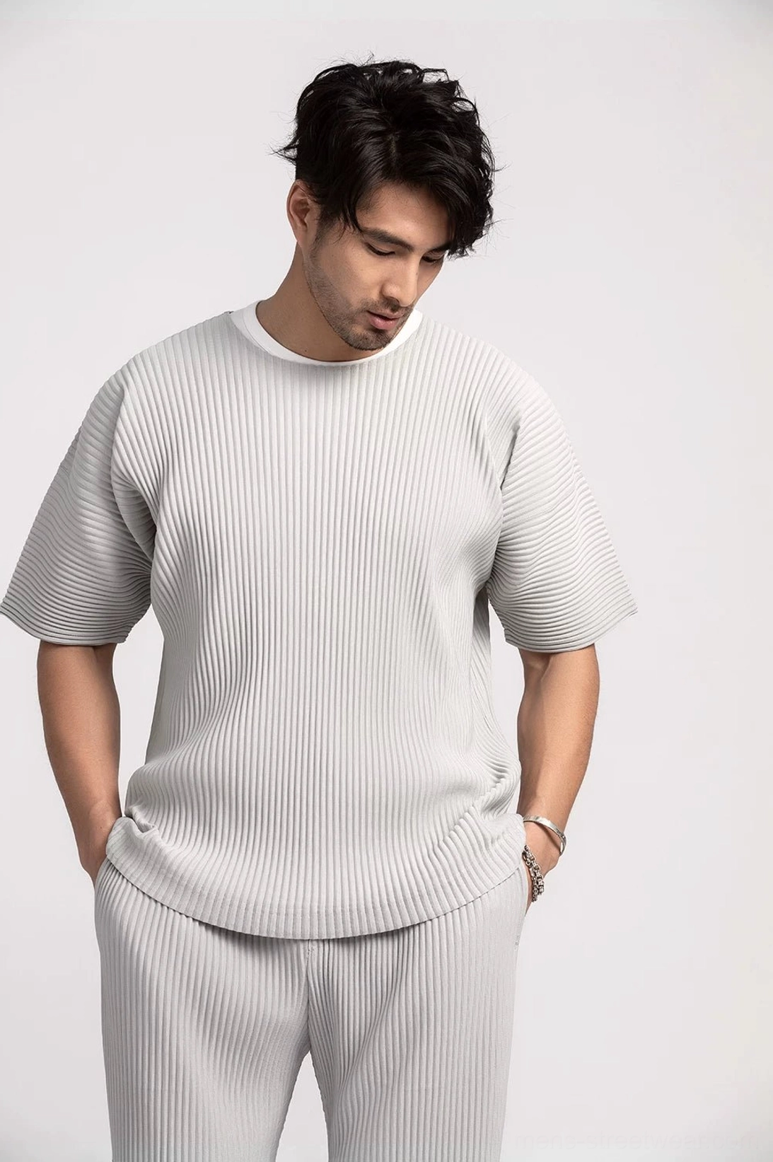 Light grey ribbed pleated boxy tee with contrast crew neck styled in a clean minimalist streetwear outfit