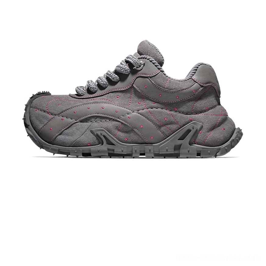 Light grey TrailGrid chunky sneakers in side profile with padded collar, contrast stitching and geometric rugged outsole