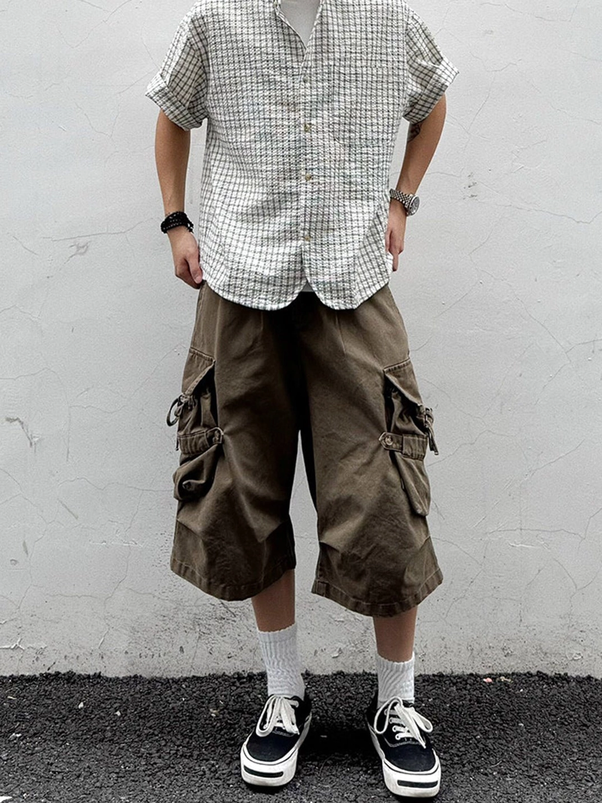 Light micro check oversized short sleeve shirt with chest pocket worn with brown cropped cargo pants and skate shoes