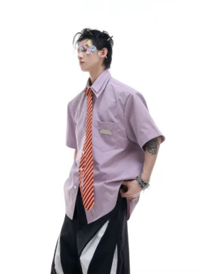 Light purple oversized short sleeve dress shirt with orange red striped tie and matching wide leg pants