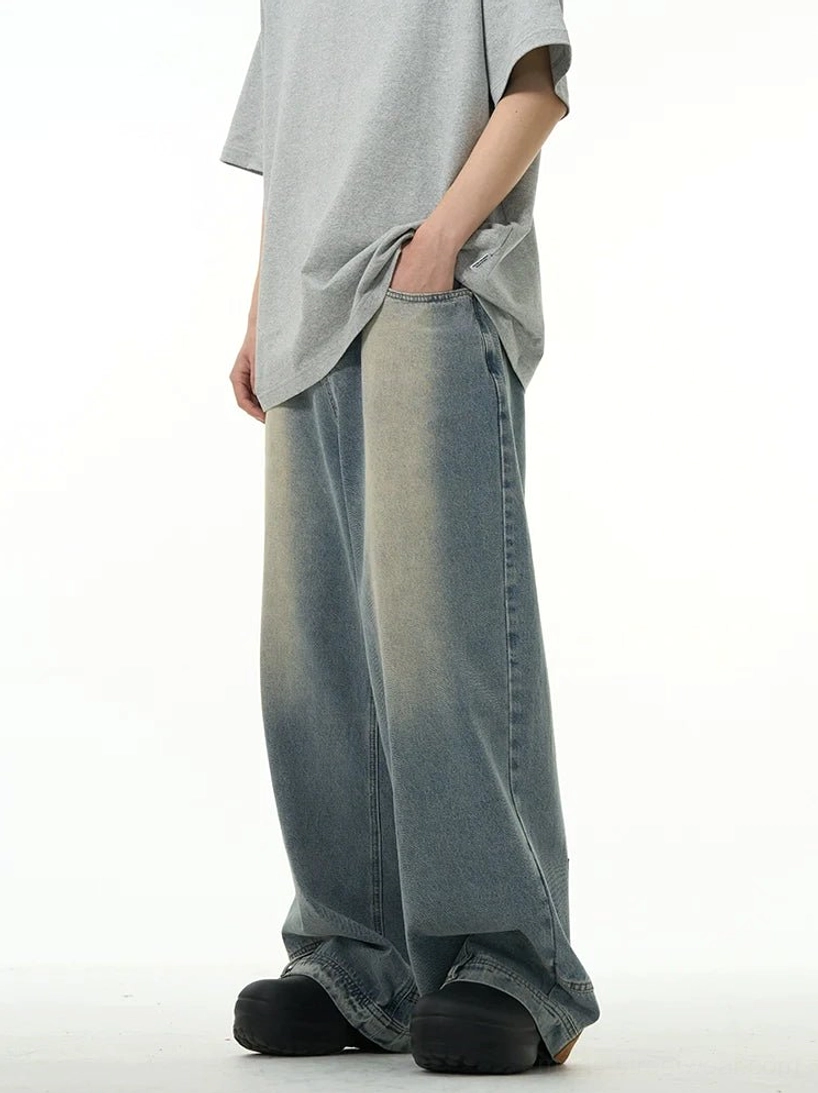 Right side view of light washed blue inside-out wide-leg jeans with spacious side pockets, long leg, and double-layered cuffs