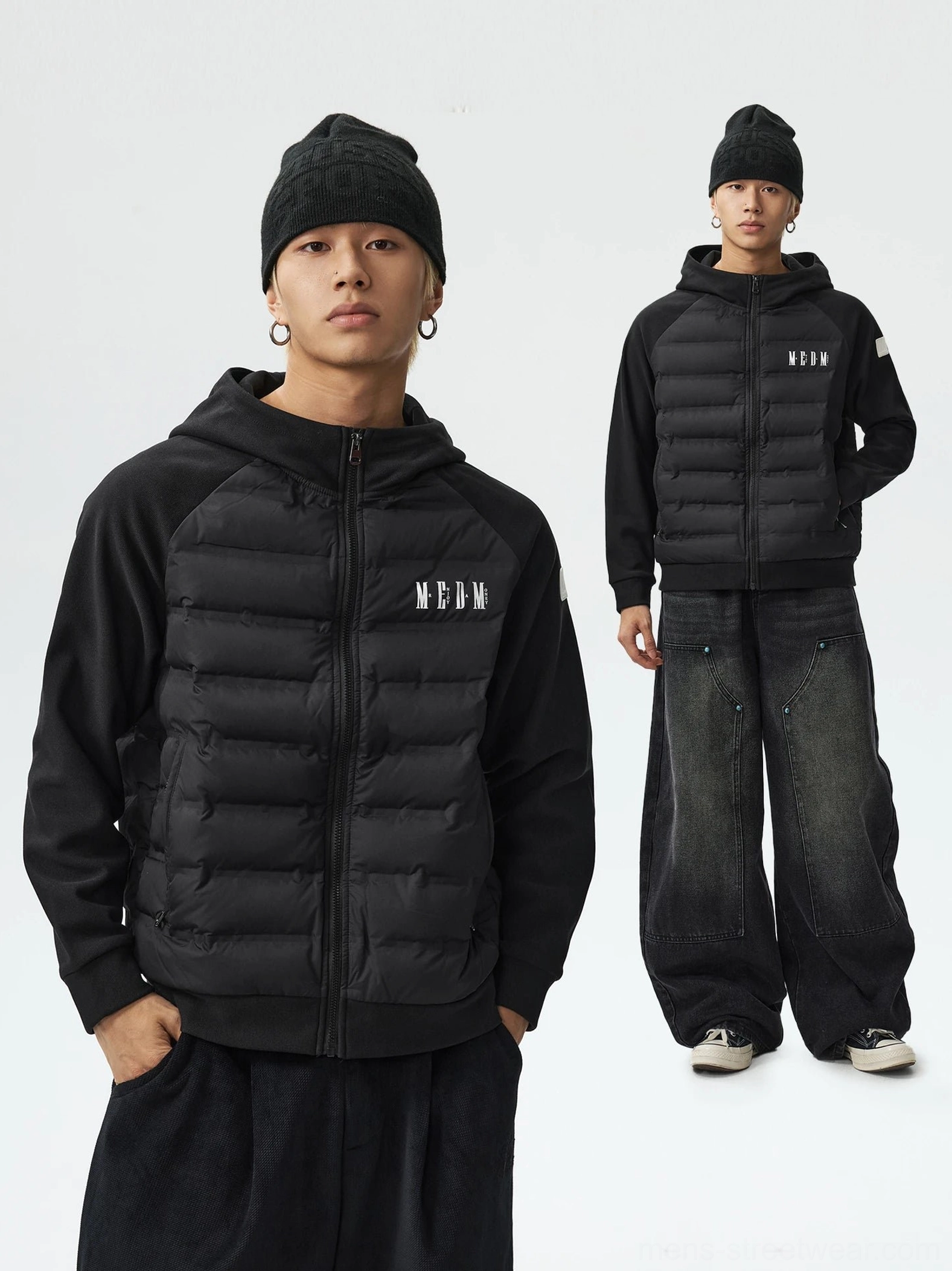 Black lightweight hybrid hooded goose down jacket with quilted body and raglan sleeves front studio view