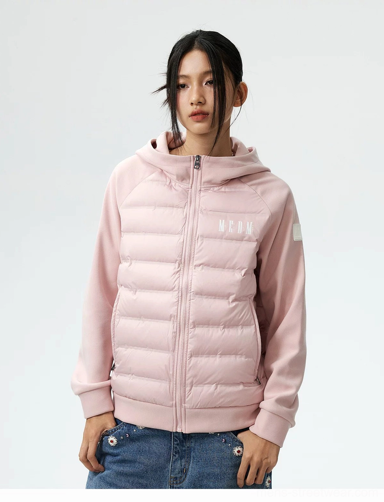 Lightweight hybrid hooded goose down jacket streetwear outerwear detail showing soft stretch sleeve construction