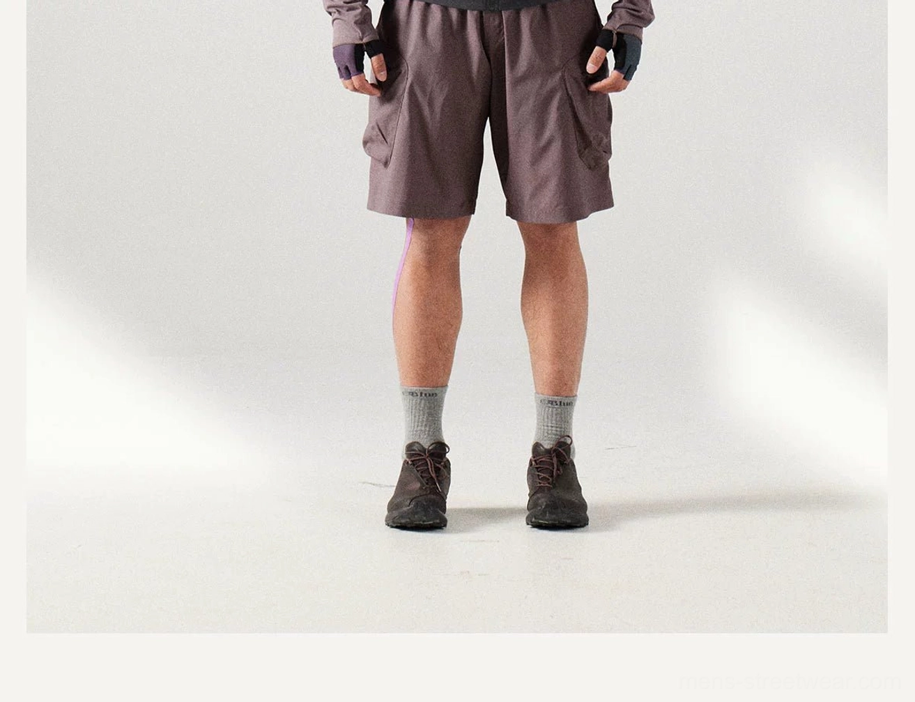 Lightweight men's cargo shorts designed for summer streetwear, travel, casual outdoor activities, and moisture-wicking comfort