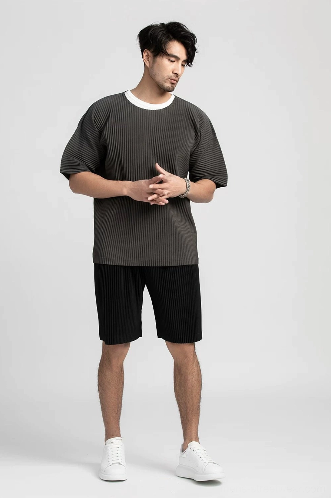 Lightweight pleated tech shorts designed for minimalist Asian streetwear and warm weather styling