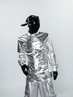 Front full-body view of a model wearing a shiny liquid metal silver long sleeve shirt with metallic cargo pants in a futuristic streetwear outfit