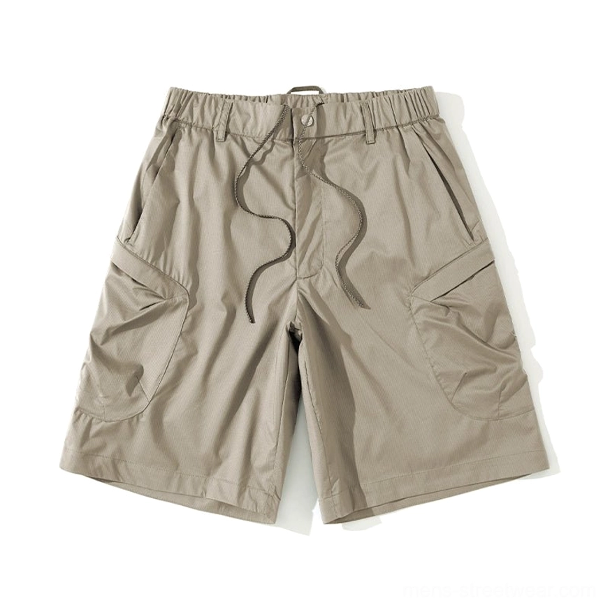 Loose fit men's cargo shorts suitable for gorpcore, techwear-inspired outfits, summer travel, and relaxed urban styling