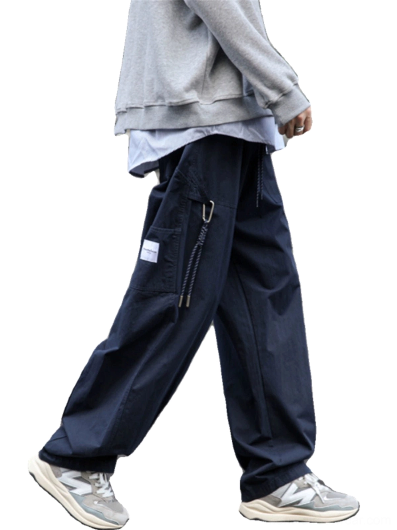 Dark navy relaxed utility cargo pants featuring adjustable drawstring side pocket and wide leg streetwear silhouette