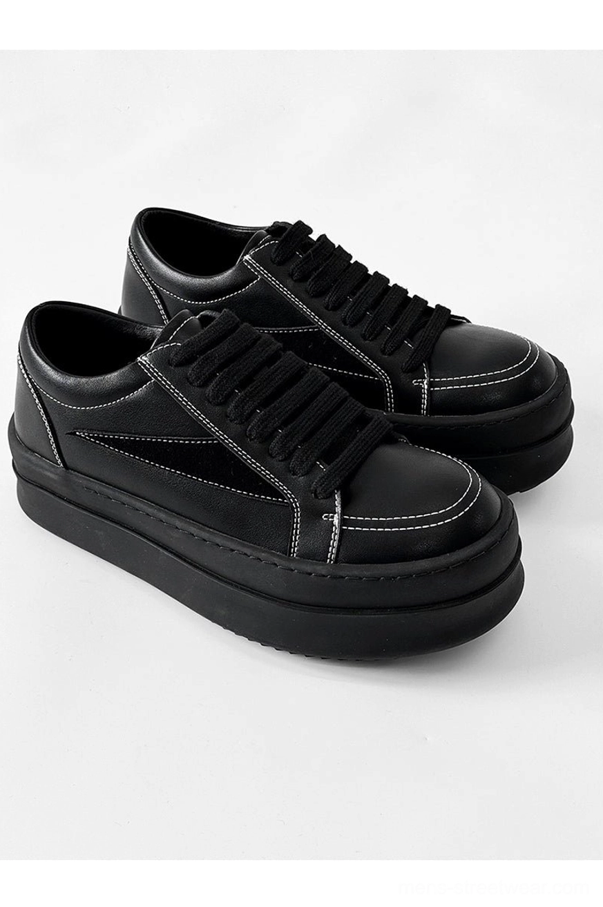 Low-top elevated platform sneakers with bold proportions for Seoul-inspired streetwear outfits