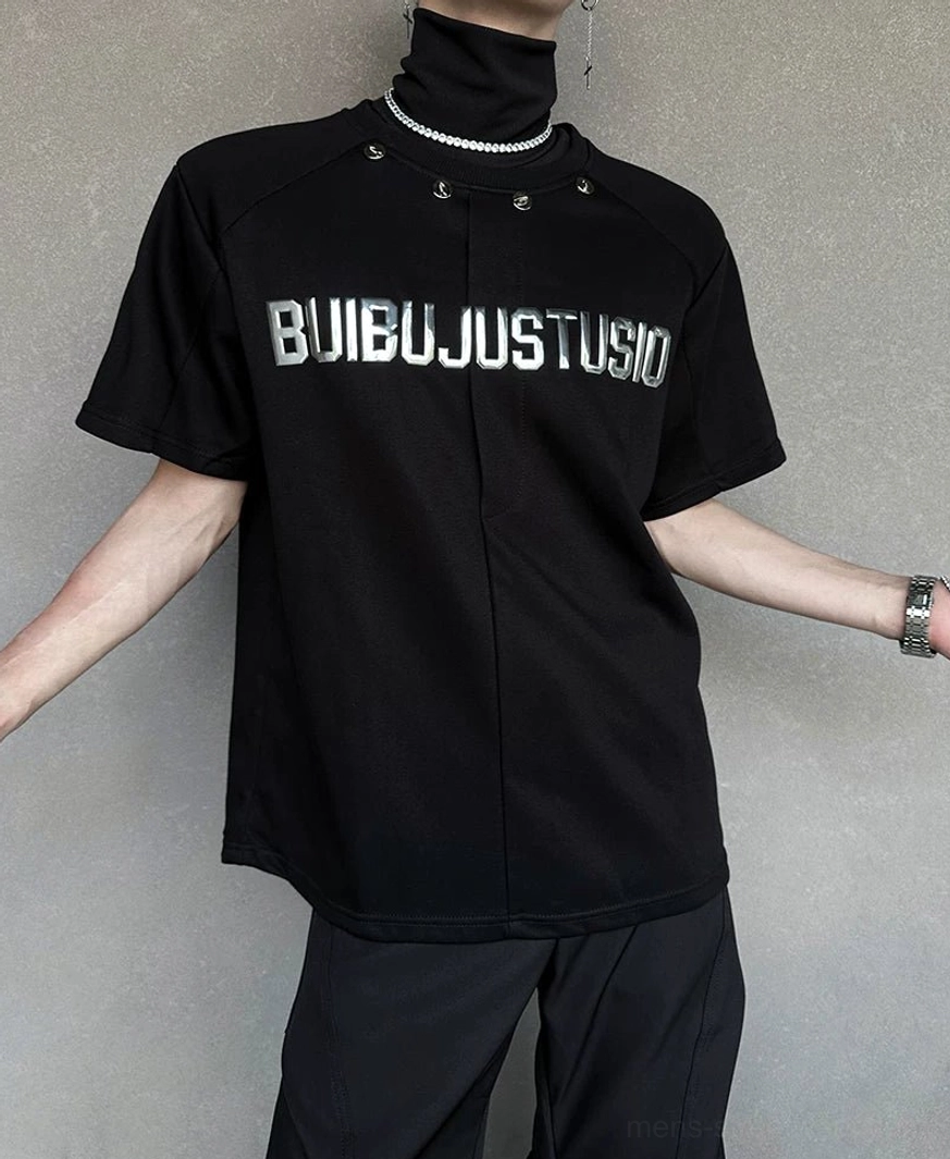 Side view of a matte black structured streetwear T-shirt showing clean seams, high neckline, and metallic collar studs