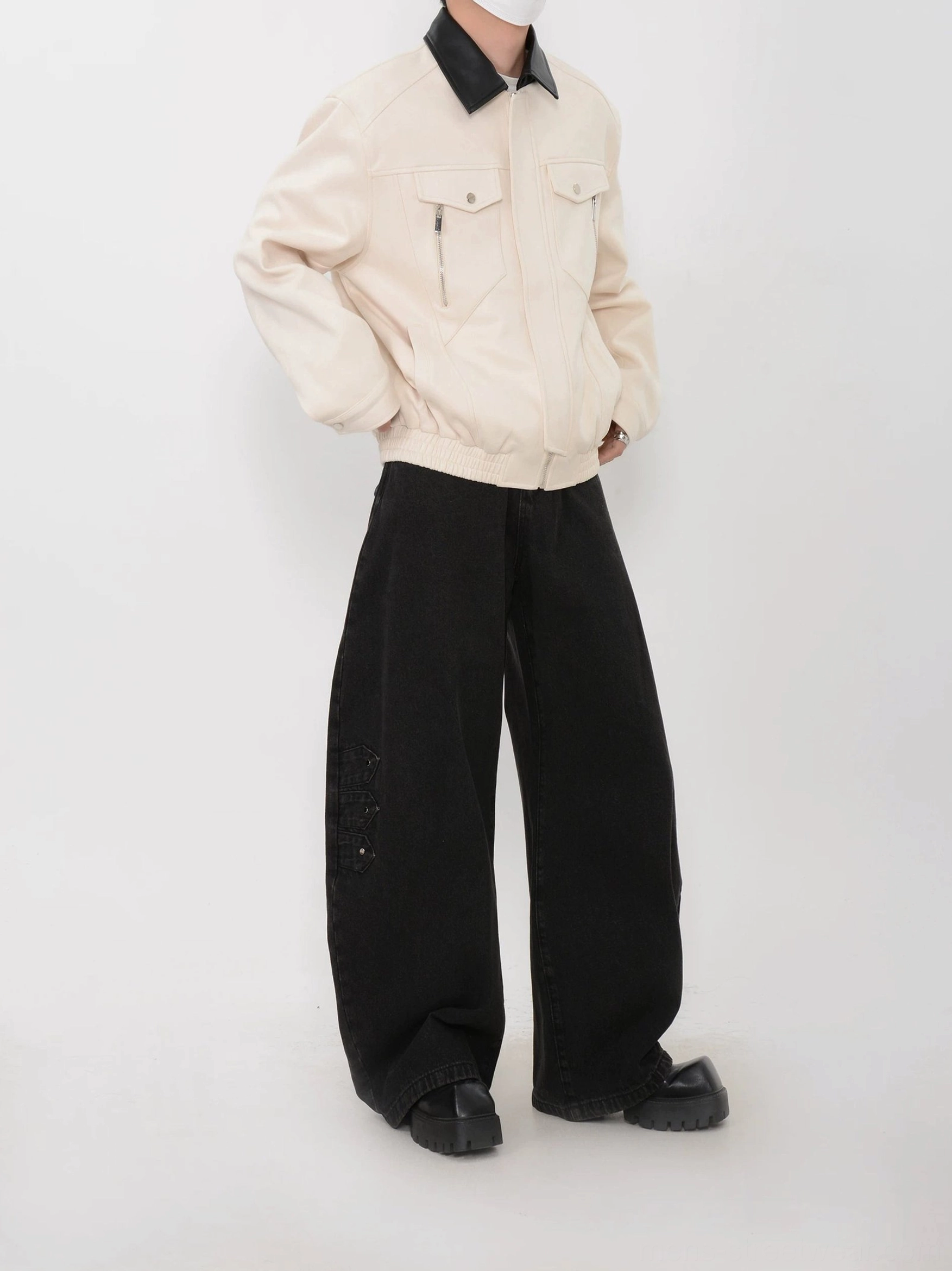Apricot faux suede streetwear bomber jacket with black contrast collar shown from rear three-quarter view