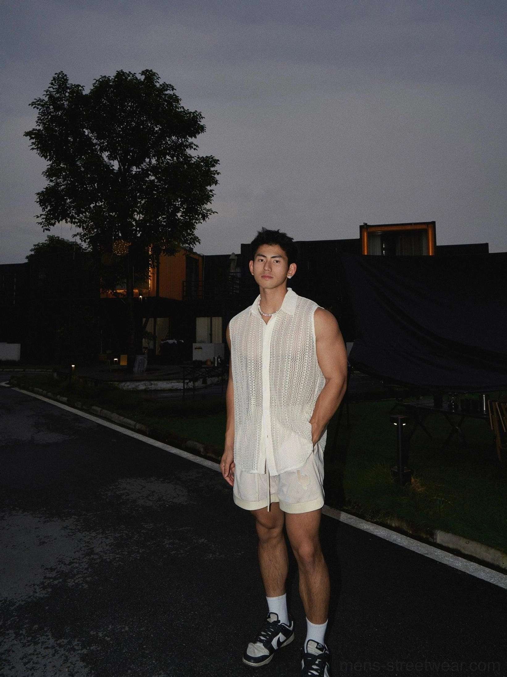 Men's apricot sleeveless open-knit crochet vest shirt full-body front view with button front and sheer hollow knit