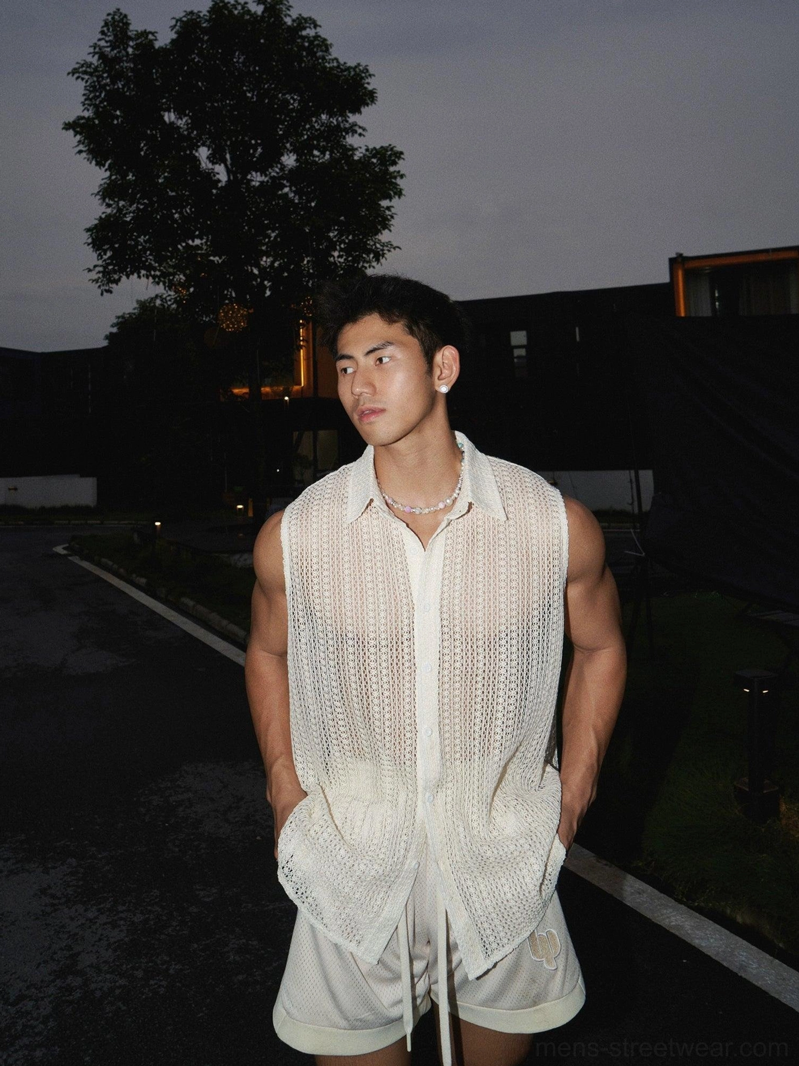 Men's apricot sleeveless open-knit crochet vest shirt side front view with button closure and breathable sheer texture