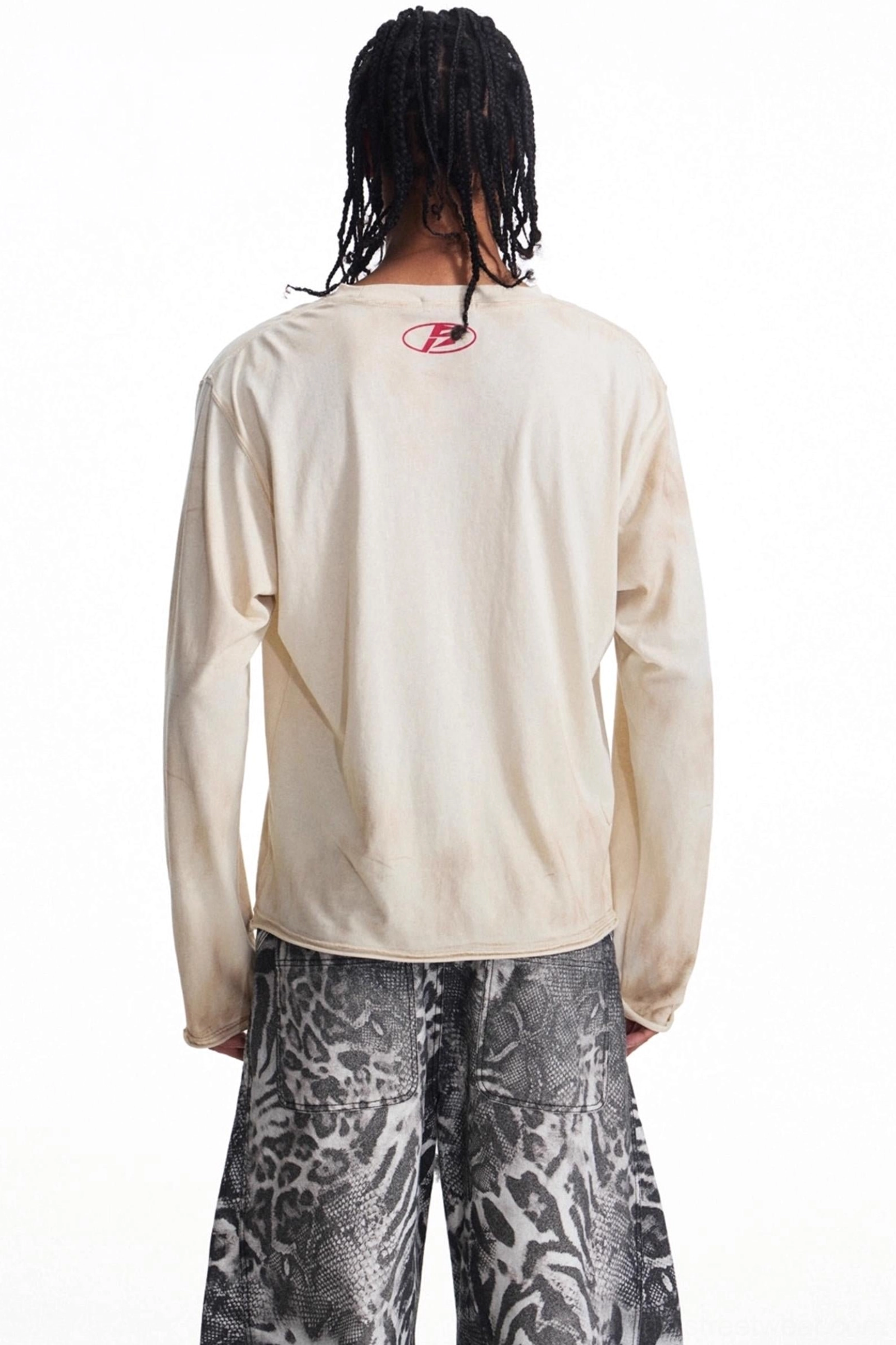 Back view of men's apricot vintage long sleeve t-shirt showing plain back and small red upper back detail