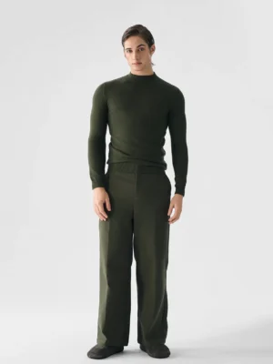 Men's army green slim fit mock neck fine knit sweater front view with matching green wide leg trousers
