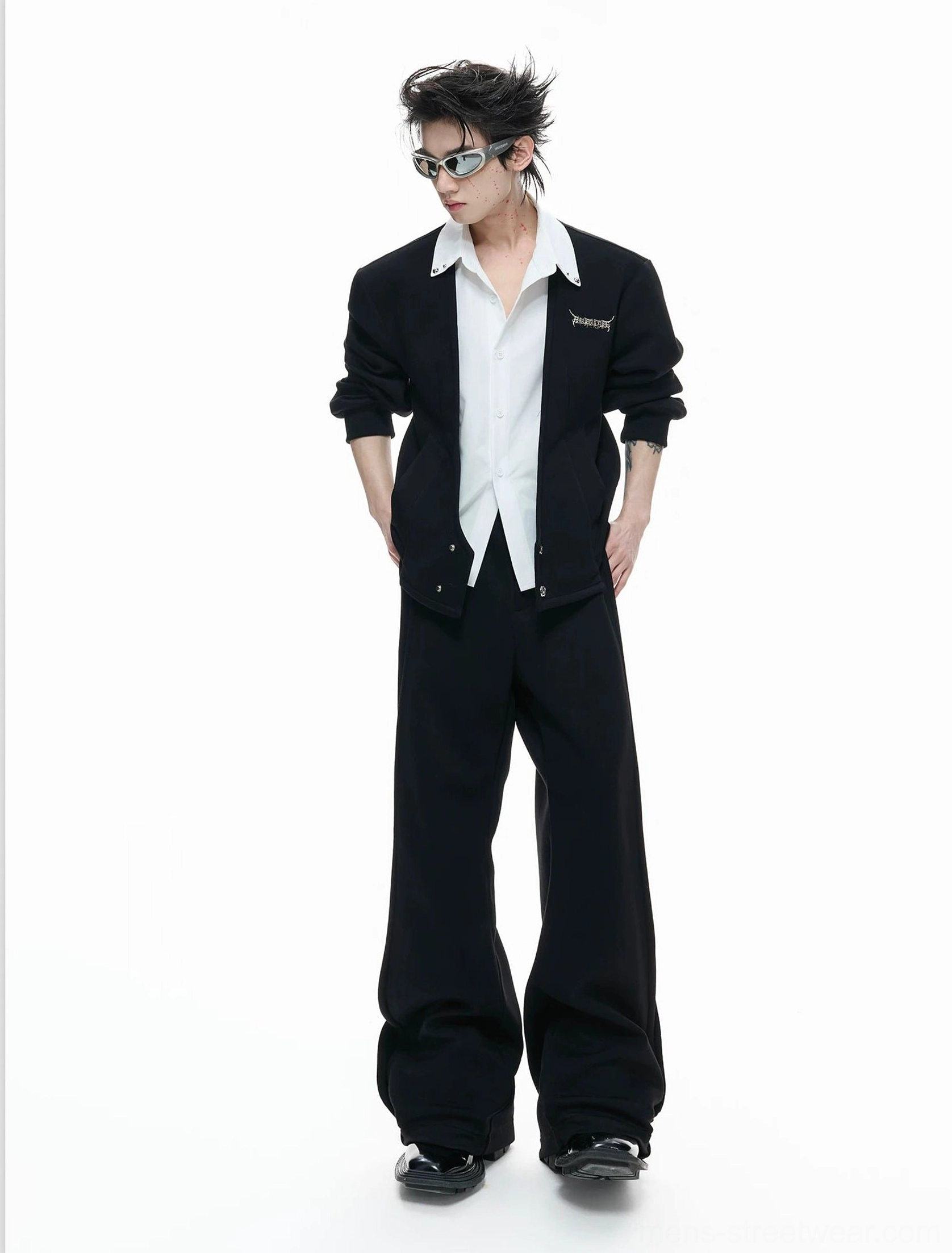 Men's black faux-twinset cardigan shirt outfit with integrated white collared shirt and relaxed loose-fit silhouette