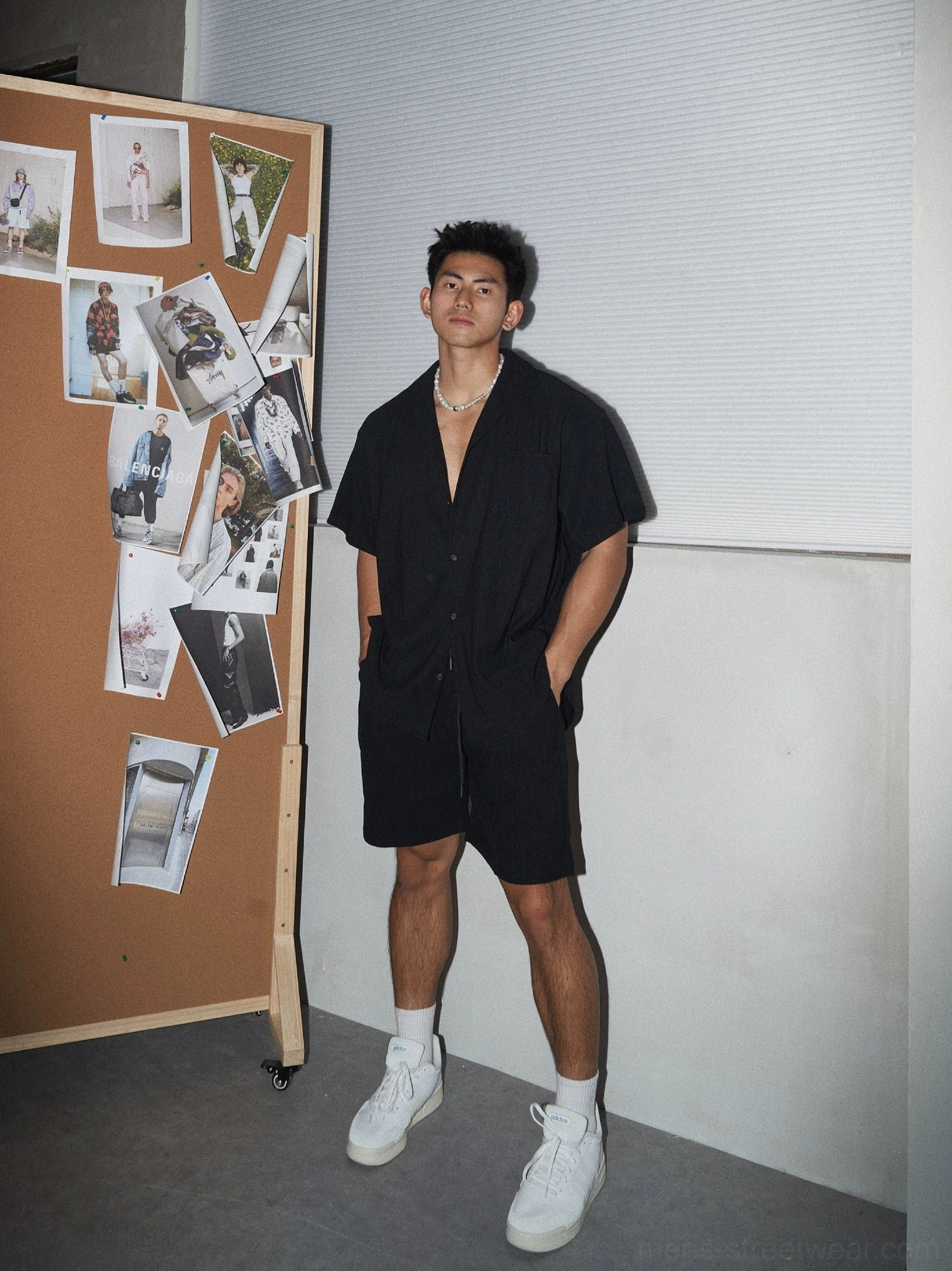 Men's black matching shirt and shorts outfit with relaxed Korean streetwear fit and casual styling