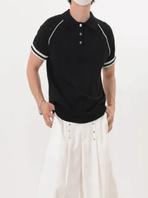 Men's black short sleeve ribbed knit polo shirt with white shoulder piping and striped sleeve cuffs front view