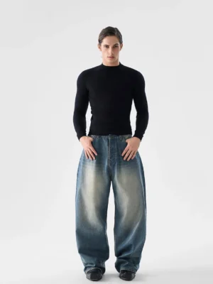 Men's black slim fit mock neck wool blend knit sweater front full body view styled with faded wide leg jeans