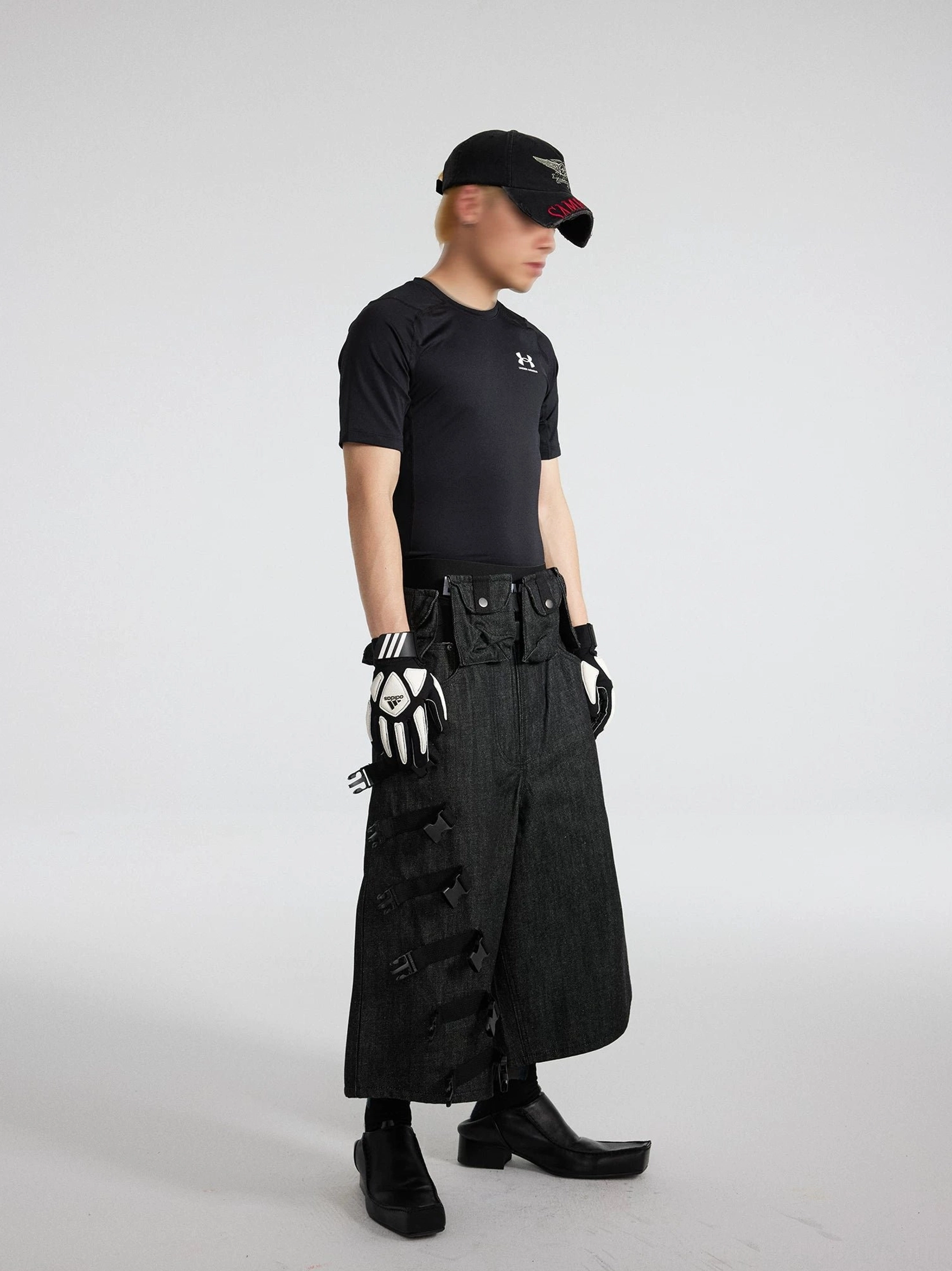 Men's black strap ladder tactical denim cargo cropped shorts front three-quarter streetwear outfit view