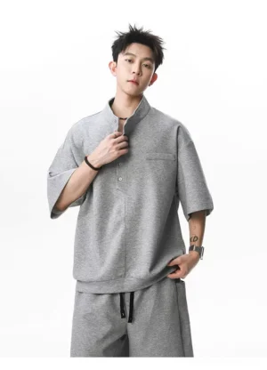 Men's boxy stand collar fleece Henley streetwear shirt close front view showing the half button placket and relaxed fit