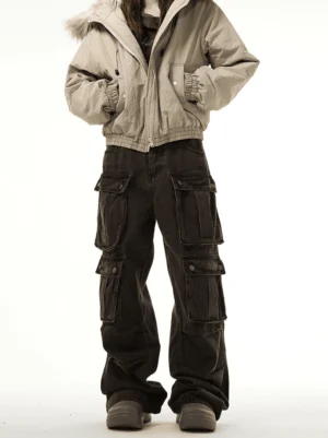 Men's brown multi-pocket workwear cargo jeans shown in a front full-body view with wide-leg washed denim and buttoned flap pockets