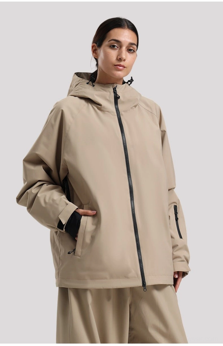 Contemporary techwear shell jacket for men with zippered pockets, adjustable hood, and oversized winter layering fit