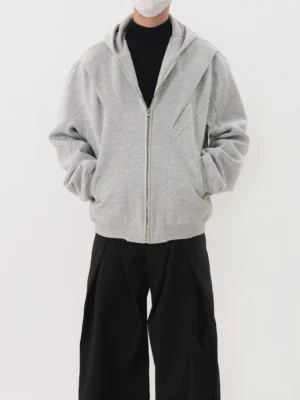 Heather gray men's seamed zip-up hooded jacket full front view showing metal zipper and side hand pockets