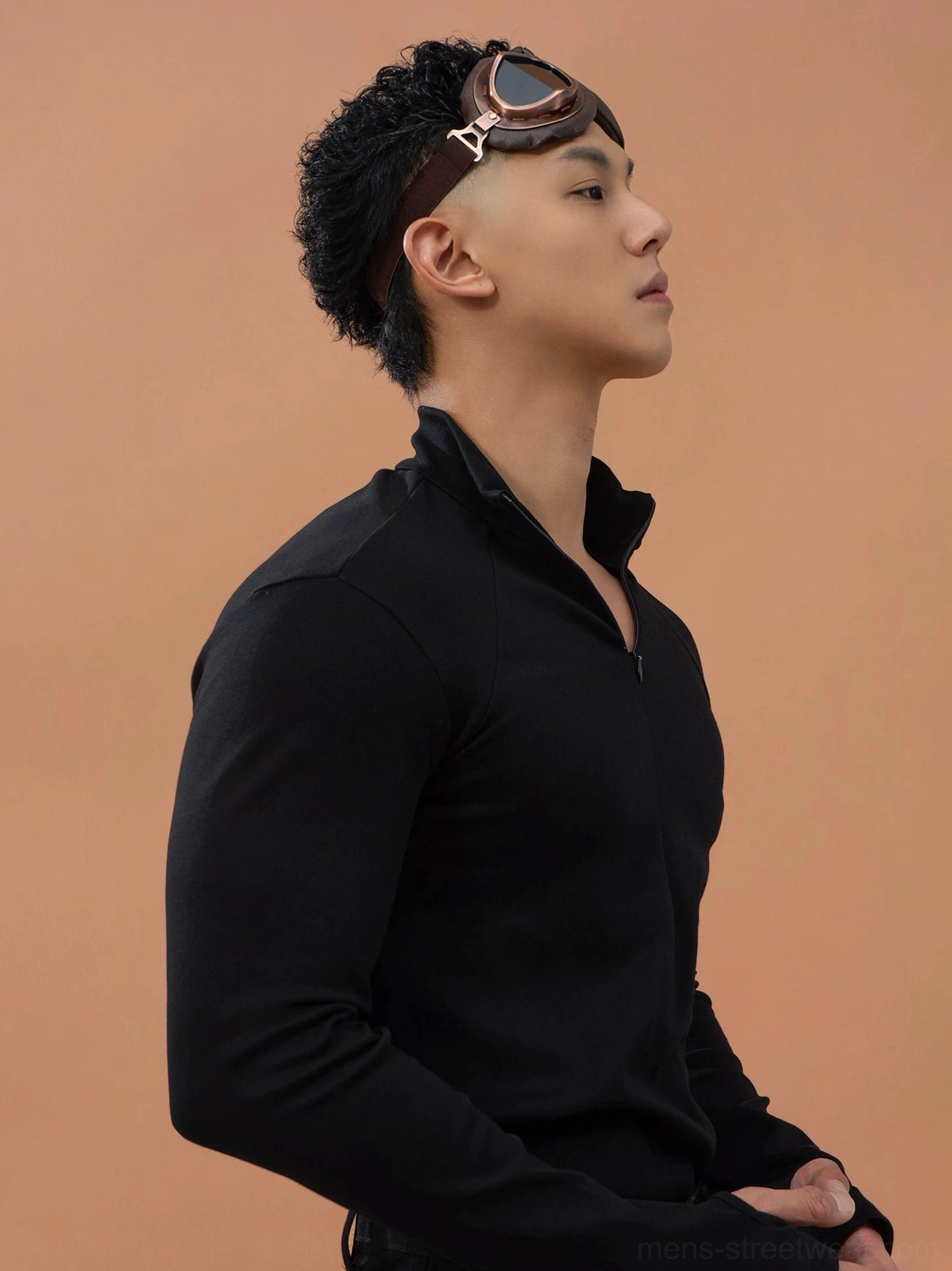 Dark gray men's fitted quarter-zip streetwear top shown from the right side with clean stand collar