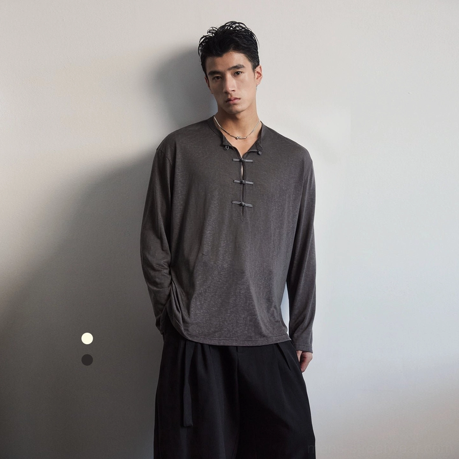 Men's dark gray loose drape long sleeve Henley tee with frog button placket in minimalist Korean streetwear styling