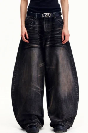 Men's dark vintage washed baggy wide leg denim jeans front view in relaxed streetwear styling