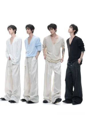 Men's deep V-neck button knit long sleeve tops in white light blue beige and black with wide leg trousers on studio models