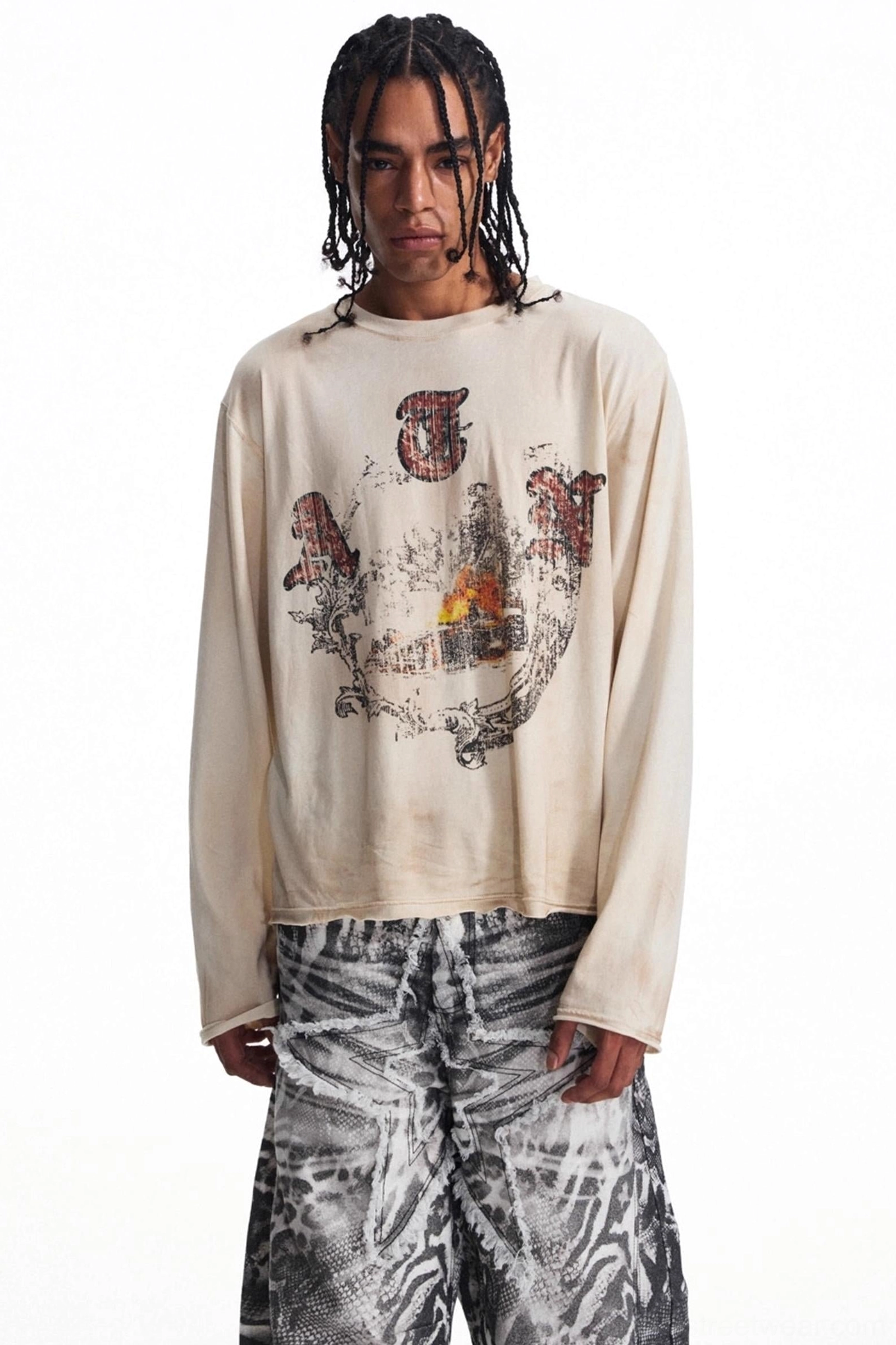 Close front view of men's faded apricot crew neck long sleeve graphic streetwear t-shirt with retro print