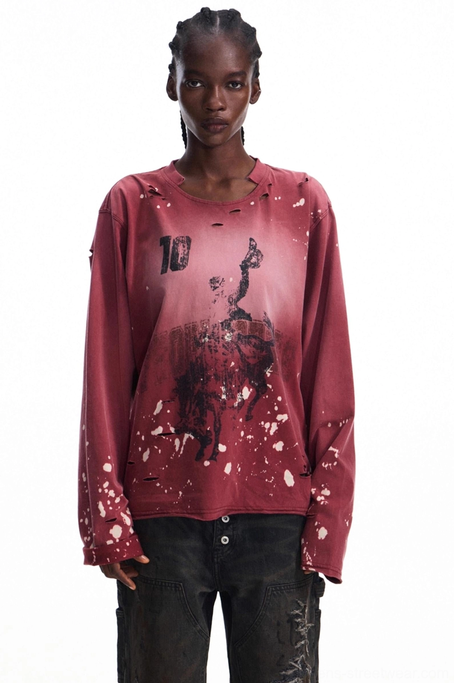 Front view of a men's faded burgundy ink-washed long-sleeve graphic T-shirt with number 10 print, abstract artwork, white splatter details, and distressed sleeve trims