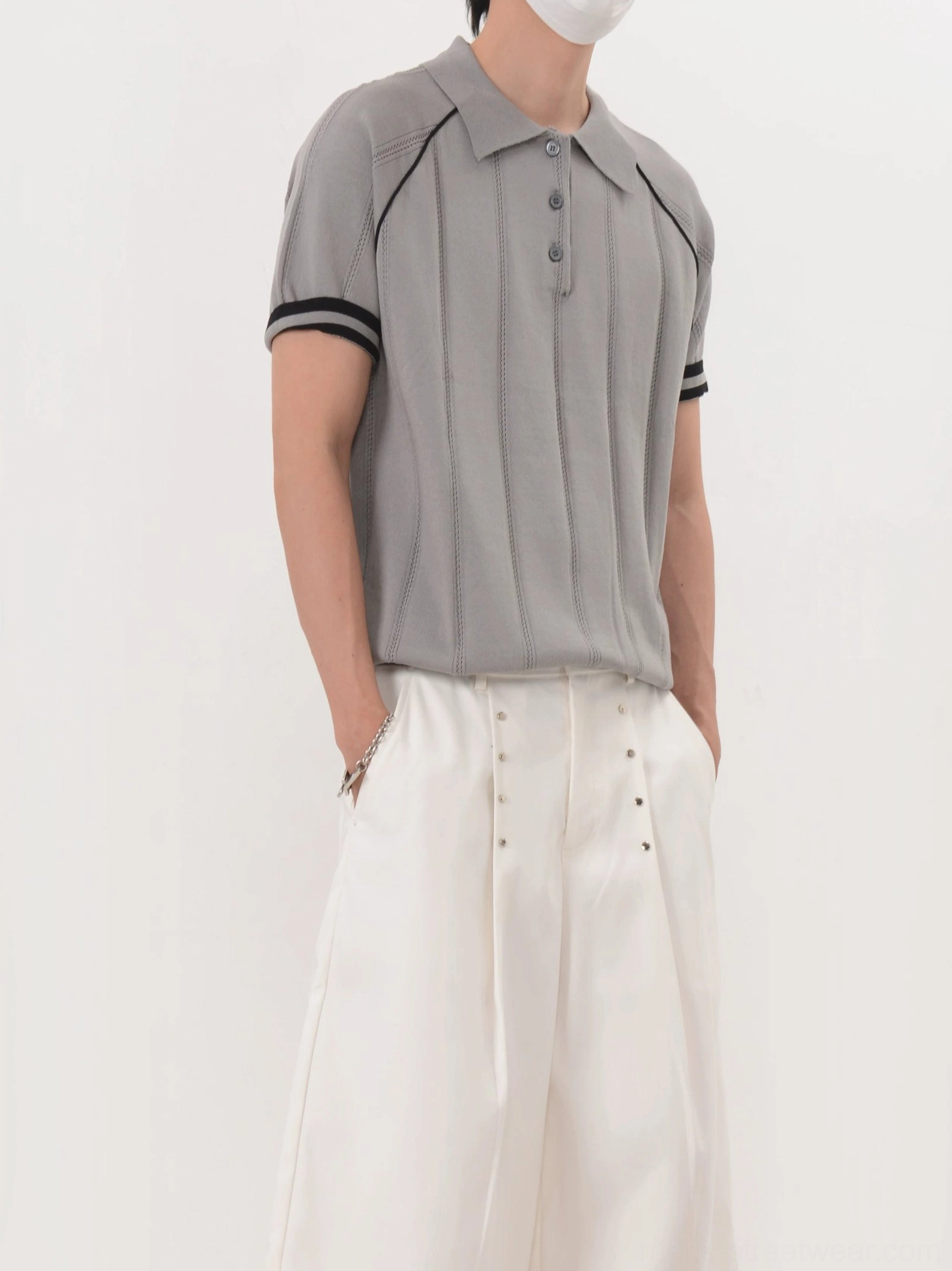 Men's gray retro ribbed knit polo shirt with black contrast sleeve bands styled in Korean streetwear