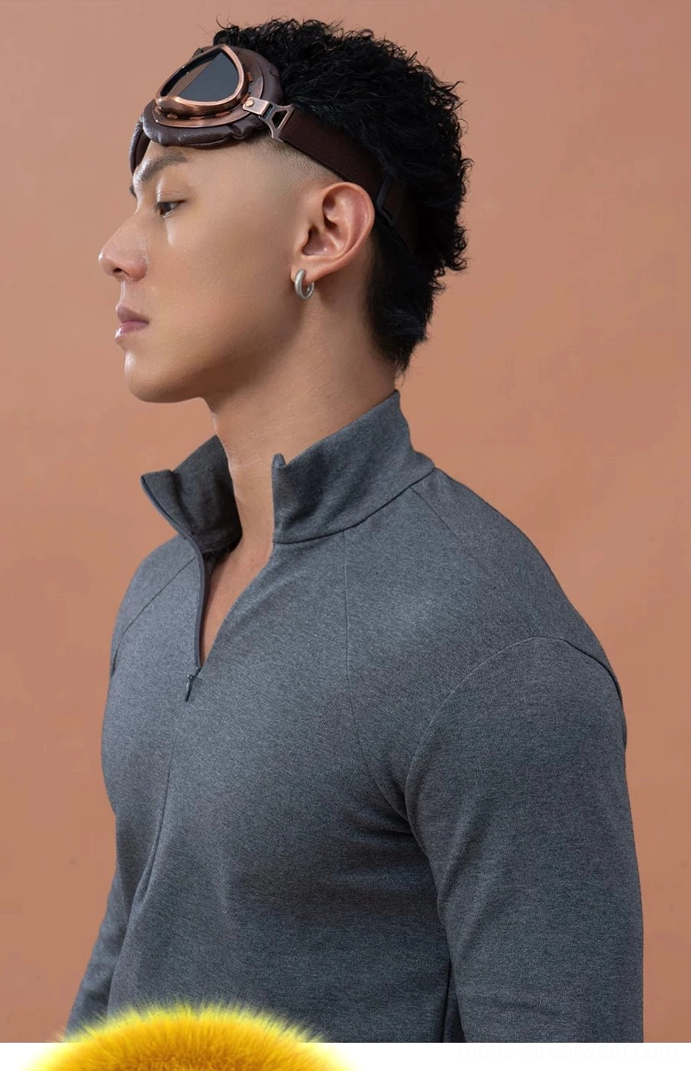 Heather gray men's stretch quarter-zip top close-up showing stand collar zipper and tailored slim fit