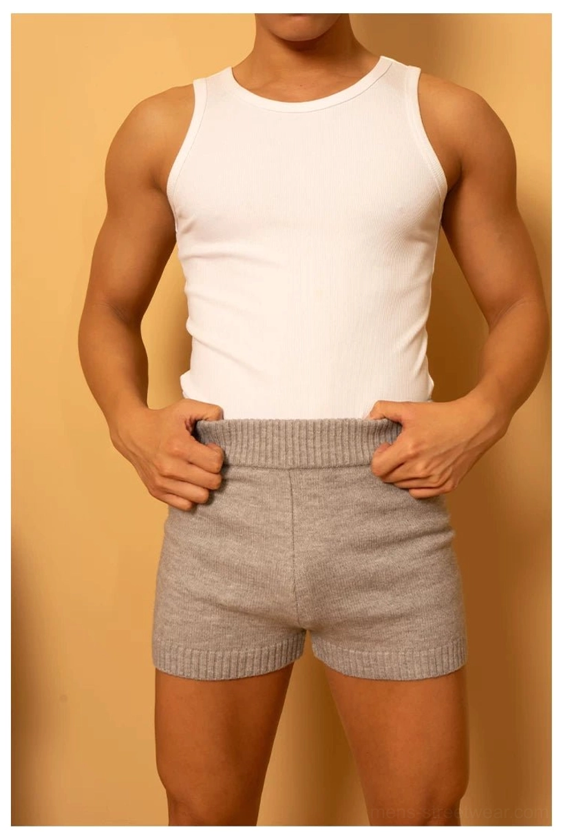 Close front view of men's heather gray ribbed knit lounge shorts showing the smooth rib texture and elastic waistband