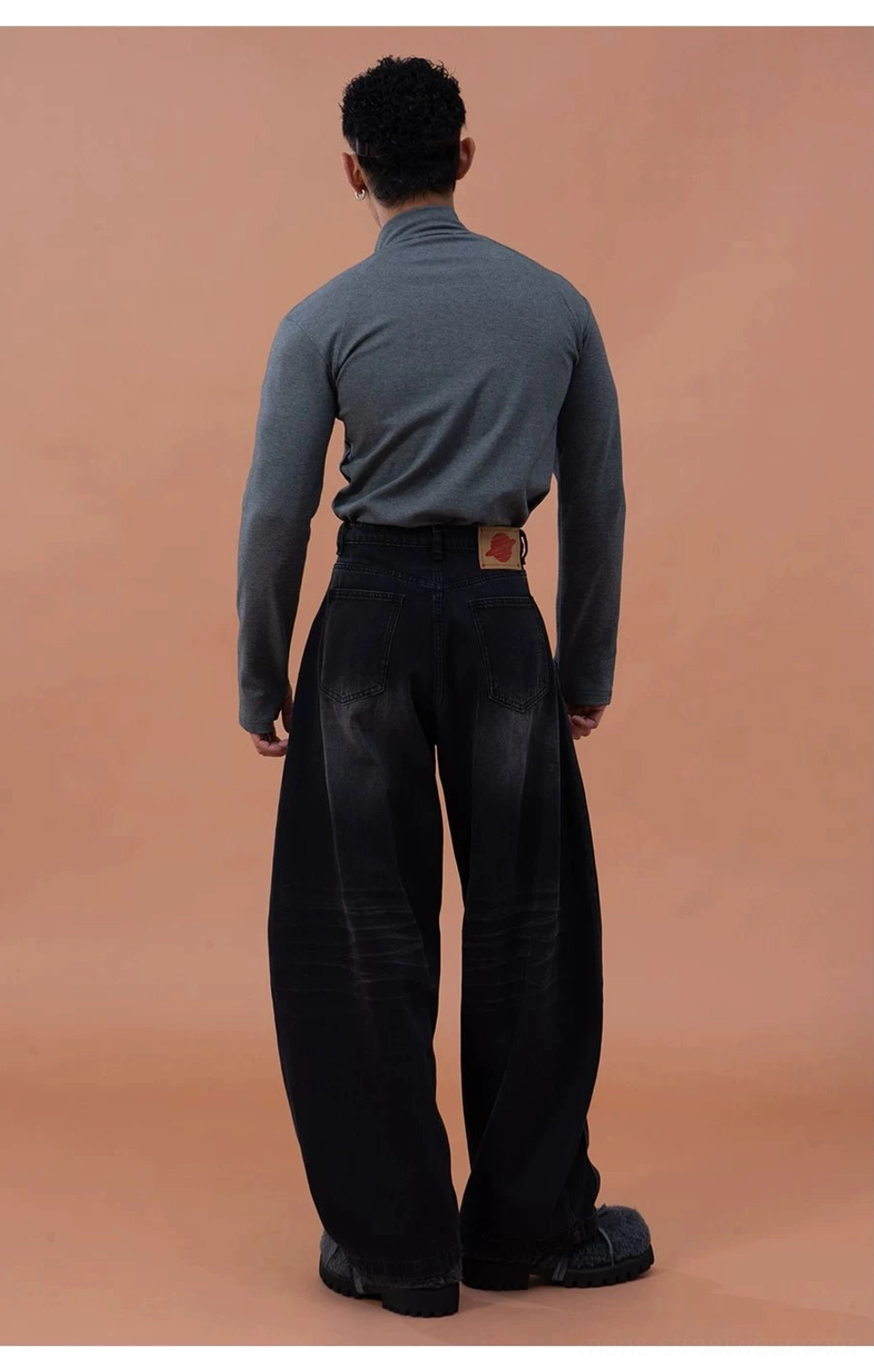 Heather gray men's slim-fit quarter-zip long-sleeve top shown from the back with clean minimalist design