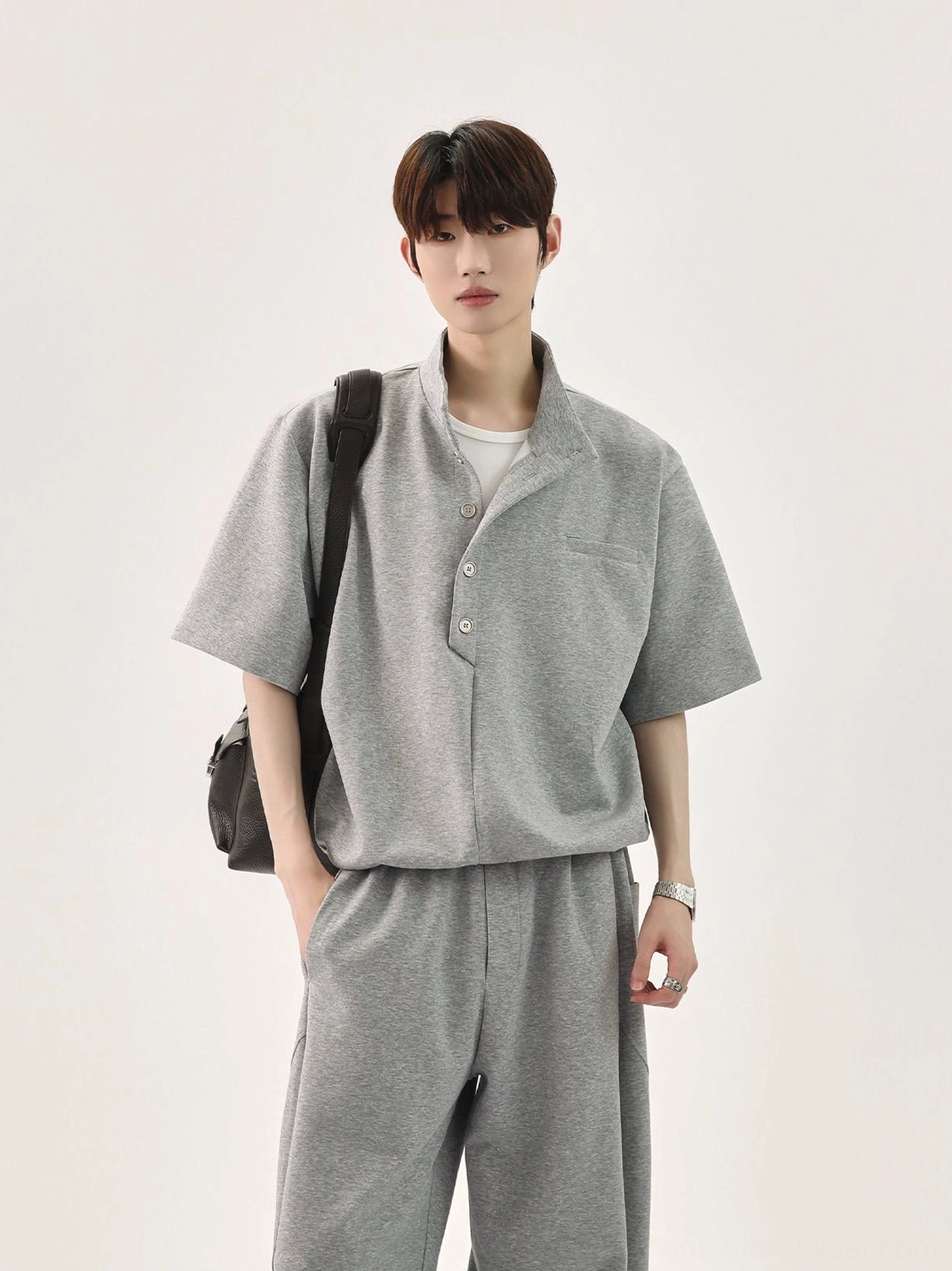 Men's heather grey stand collar polo and wide-leg trousers outfit with relaxed Seoul streetwear silhouette