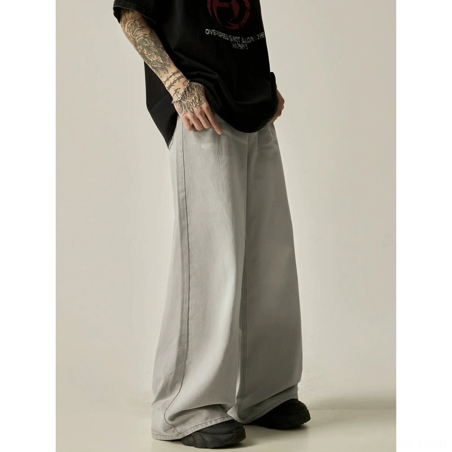 Rear side view of men's light gray oversized wide-leg denim jeans showing the relaxed straight wide-leg fit