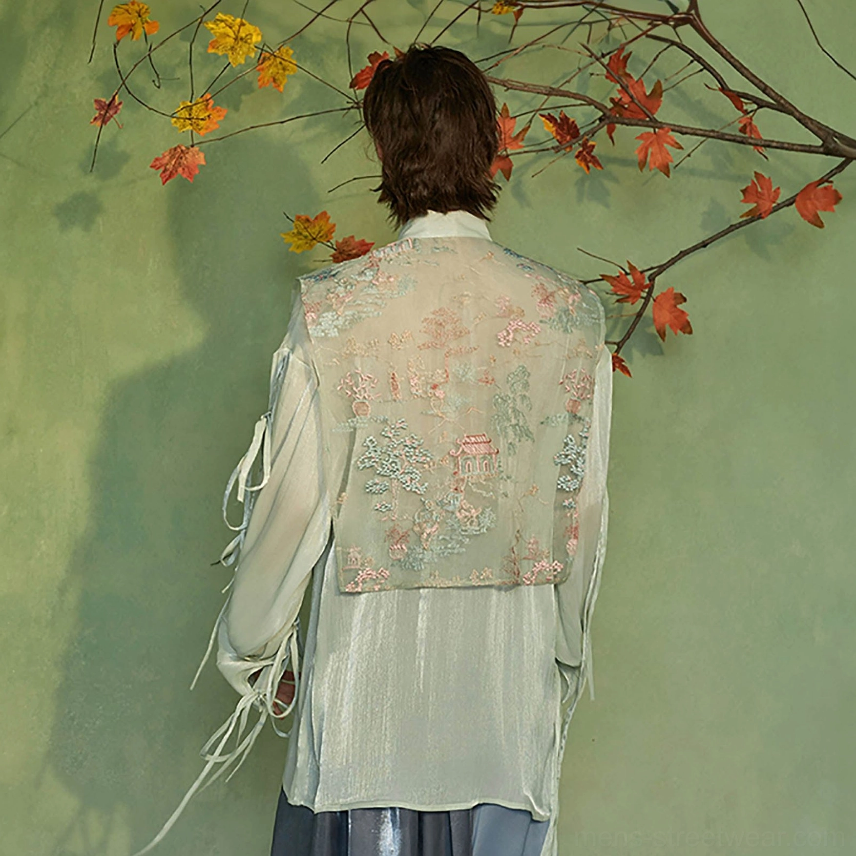 Back view of mens mint green Hanfu inspired embroidered vest jacket with full landscape embroidery panel
