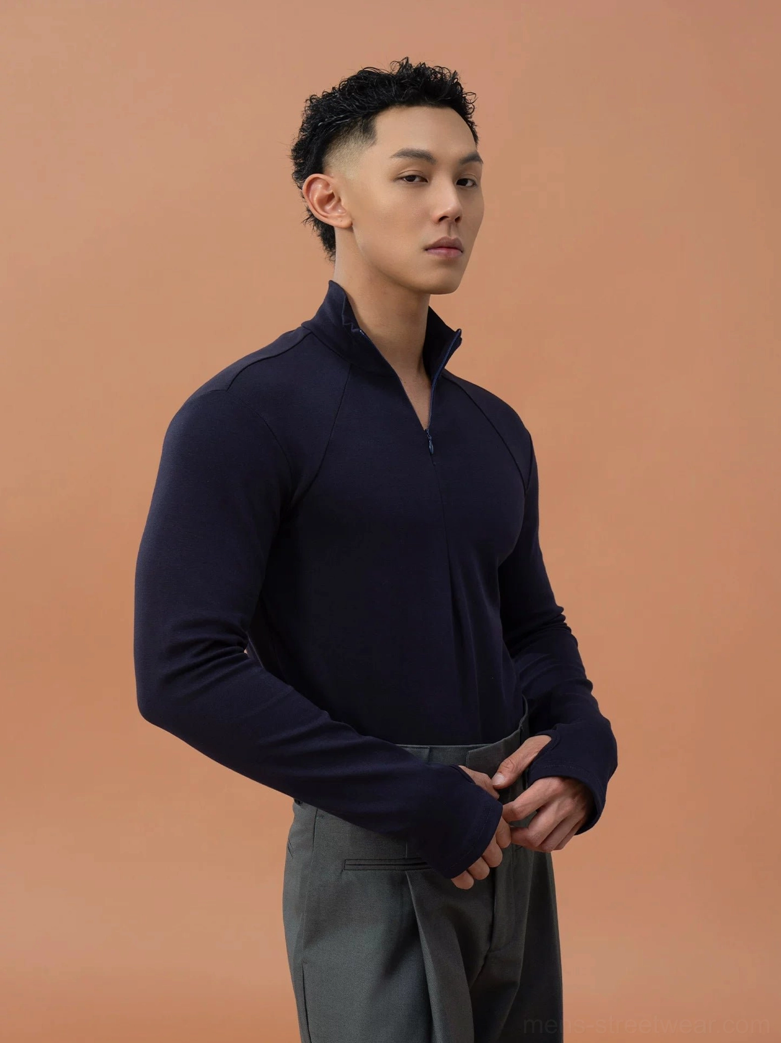 Navy blue men's Korean streetwear quarter-zip top with fitted silhouette and structured stand collar