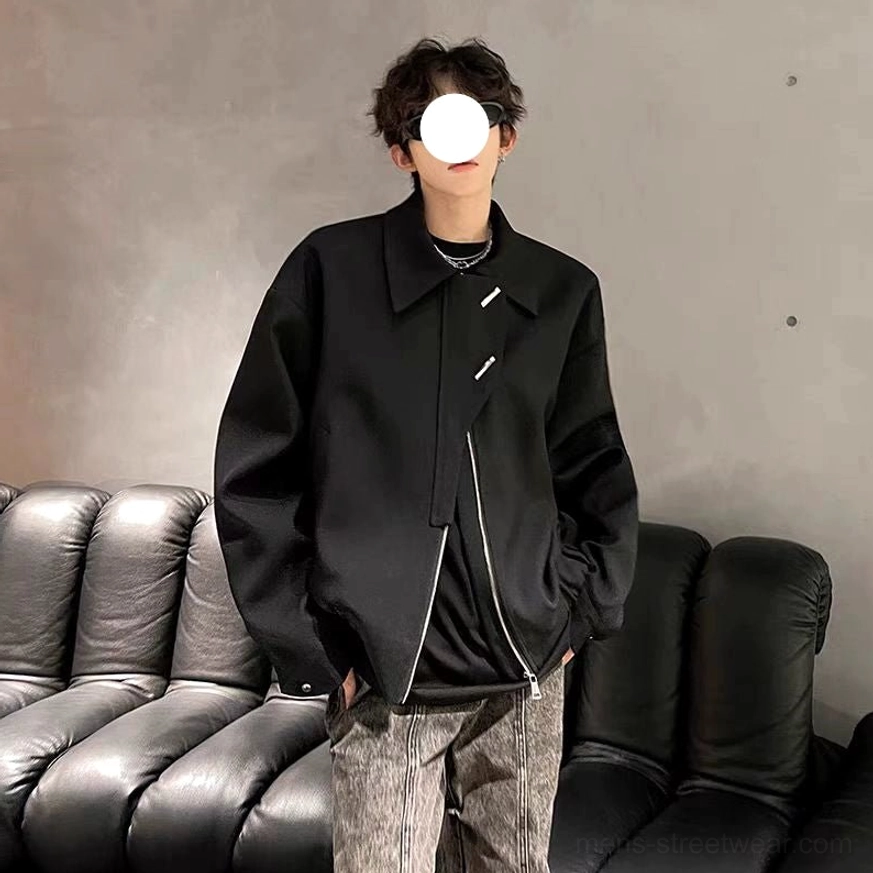 Front view of men's oversized black bomber jacket with clean zipper details and a minimalist monochrome streetwear silhouette