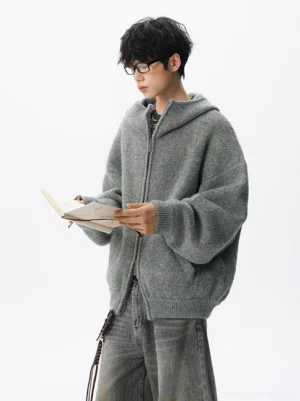 Men's light gray oversized heathered fleece knit zip-up hoodie shown in left three-quarter front view