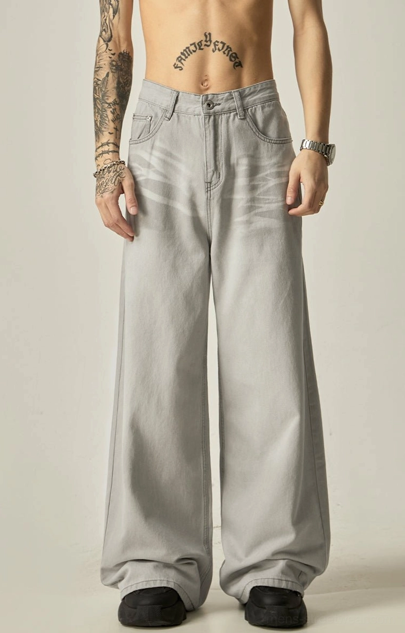 Front full-body view of men's oversized light gray wide-leg denim jeans with a relaxed straight-leg silhouette