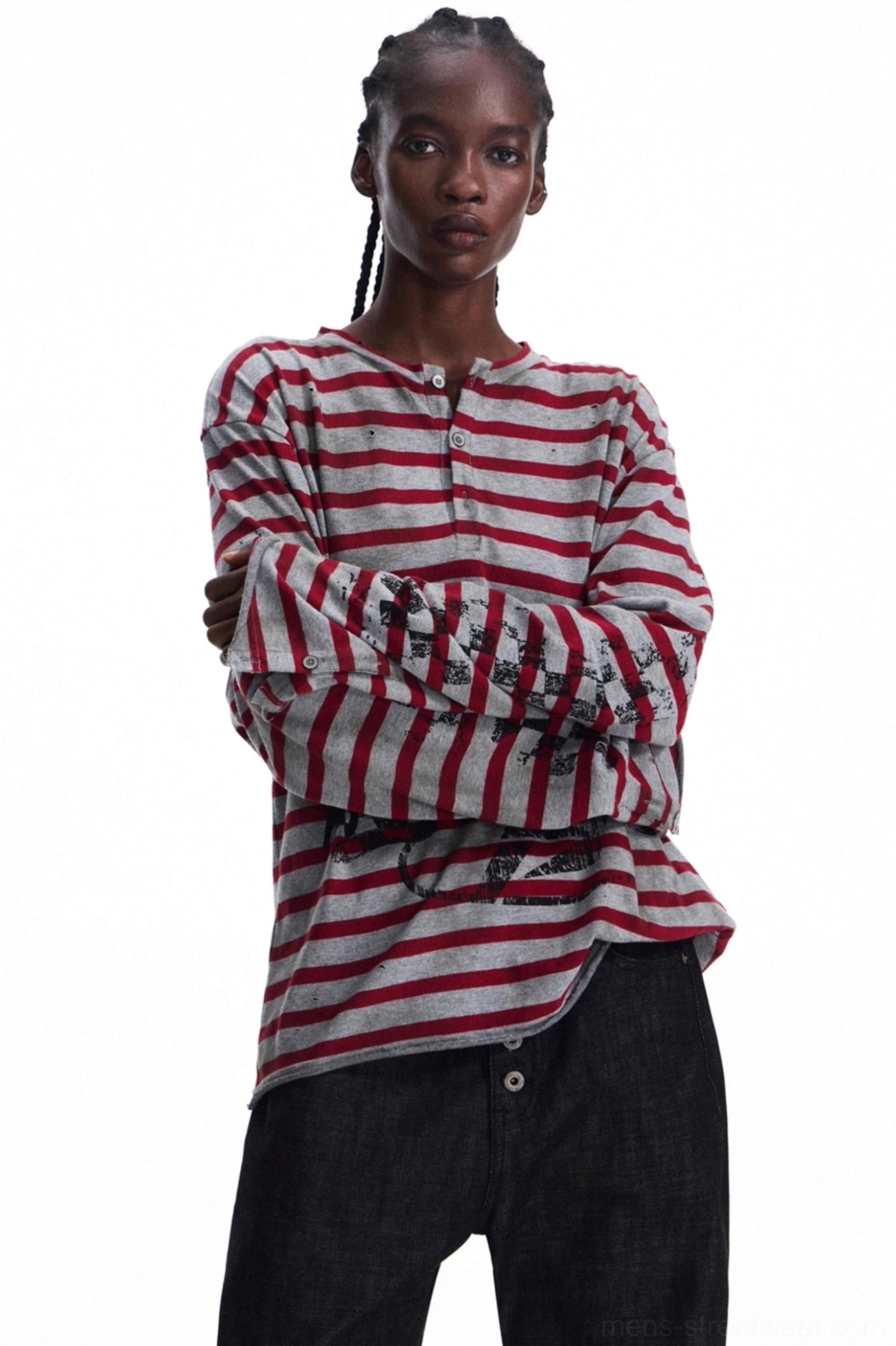 Side view of men's red and grey striped long sleeve knit Henley showing relaxed fit and button placket