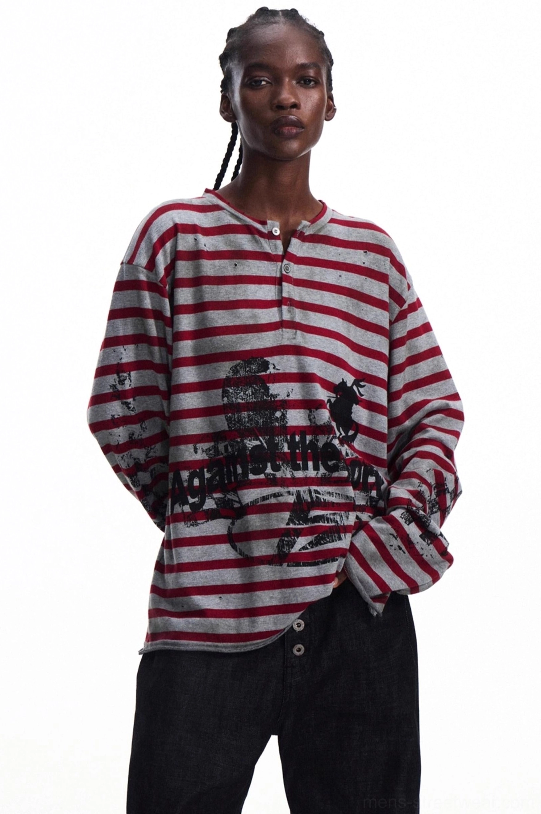 Front view of men's red striped graphic knit Henley top with half-button neckline and curved hem