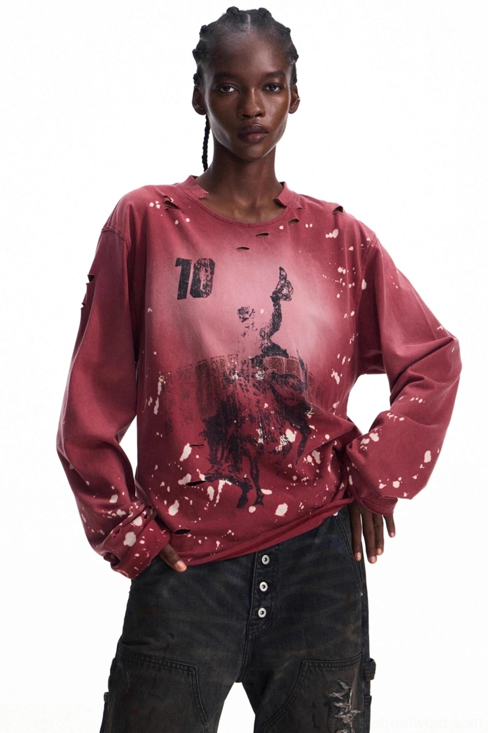 Relaxed fit men's vintage burgundy streetwear long-sleeve T-shirt shown from the front side with number 10 graphic, abstract print, ink splatters, and distressed collar